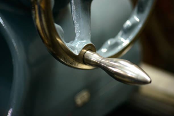 Parts and details on an old industrial lathe (industrial machining tool)