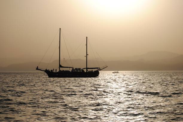istock Silhouette of a sailing ship Aqaba Red Sea 656546606