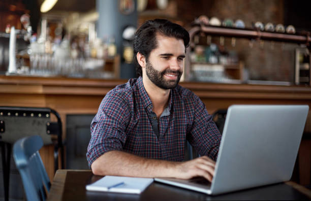 istock Keeping his regular customers updated with an e-newsletter 656547496