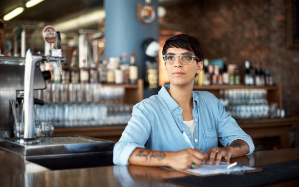 istock She controls the stock of the bar 656547556
