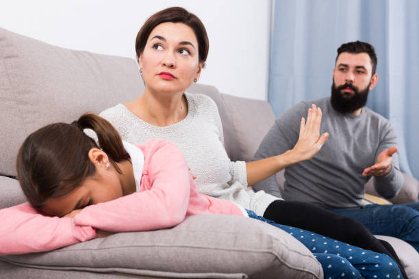 istock Father lecturing wife and daughter 656550072