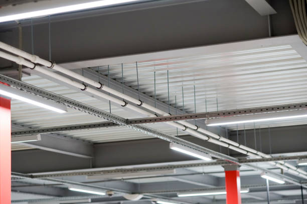 istock installation of lighting fixtures suspended ceiling 656551074