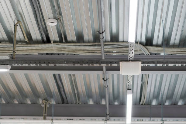 istock installation of lighting fixtures suspended ceiling 656551946