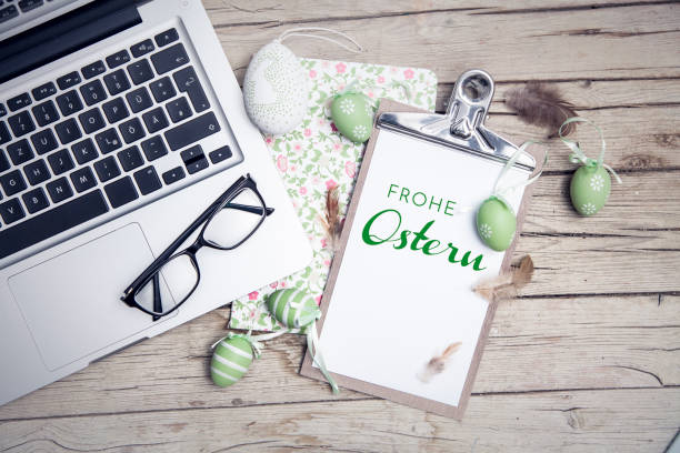 istock easter background with eastereggs and butterflies on wooden table an notebook 656554890