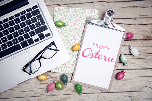 istock easter background with eastereggs and butterflies on wooden table an notebook 656554952