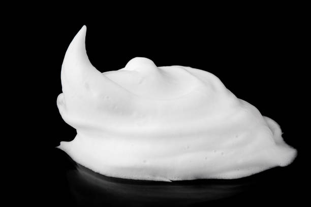 istock Soap foam Shaving cream bubble isolated on black background 656559716