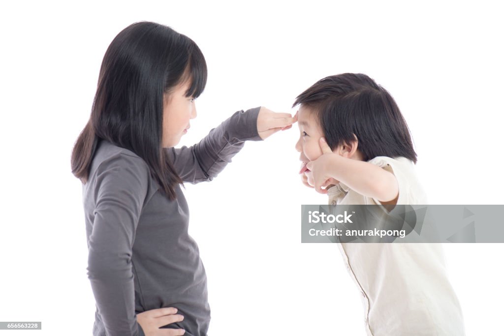 Asian sister and brother quarreling Asian sister and brother quarreling on white background isoated Arguing Stock Photo