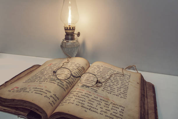 Ancient Holy Bible and eyeglasses