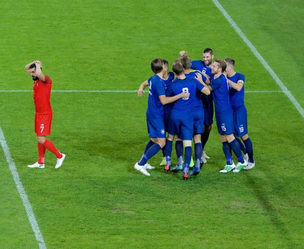 istock Soccer players celebrating 656582454