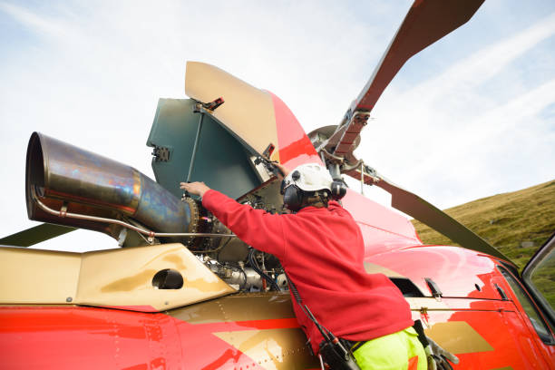 Close-Up Of Helicopter Propeller Against Blue Sky