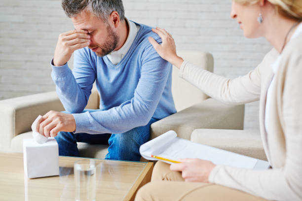 istock Psychological counseling of crying patient 656603374