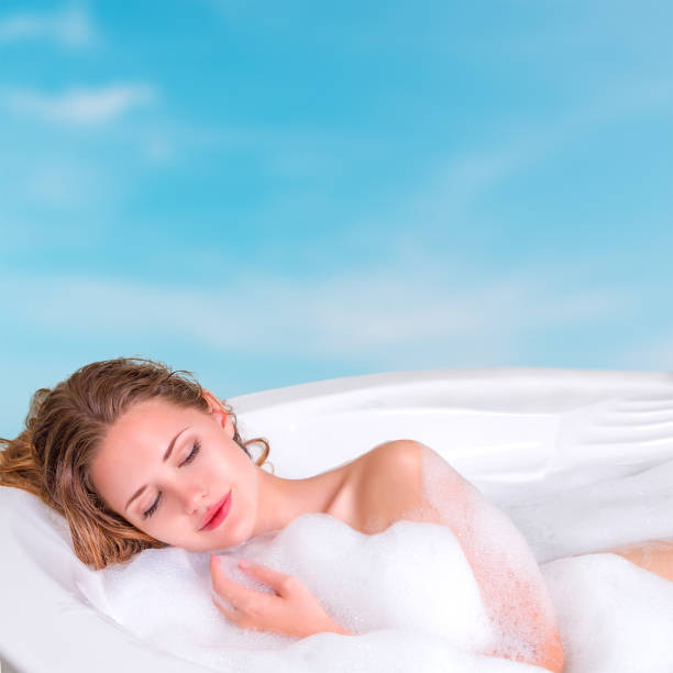 istock Young woman enjoying bath in the resort 656606374