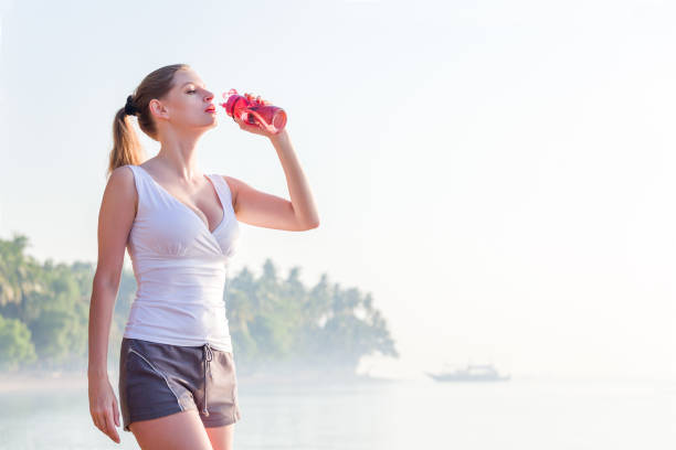 istock Woman running on the beach 656608534