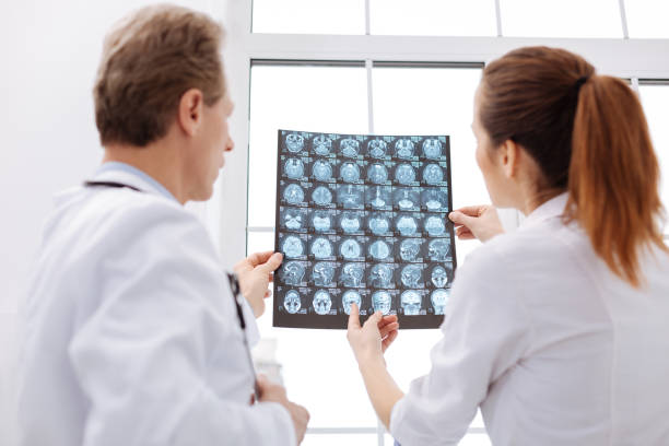 istock Busy surgeon asking his colleague for consultation 656608762