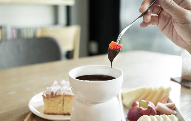 istock chocolate fondue and fruits 656611280