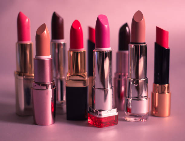 istock Set of multi-colored lipsticks on a pink background 656615960