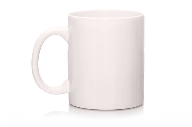 istock White mug empty blank for coffee or tea isolated on white background. White cap with shadow 656622772