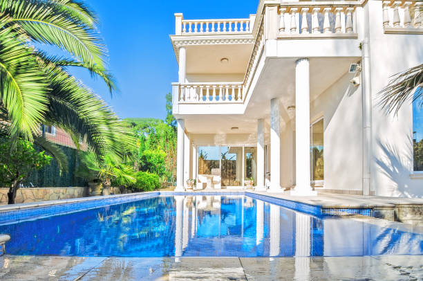 istock Luxury white house  with swimming pool. 656623406