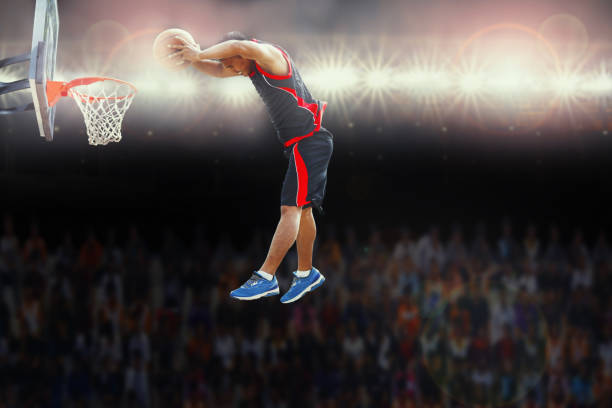istock Basketball player scoring an athletic during match 656623524