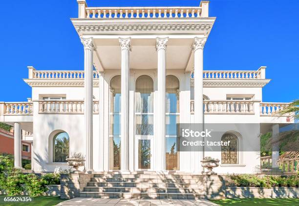 The Facade Of A Luxurious Residence With Column Stock Photo - Download Image Now - Mansion, Architecture, Building Entrance