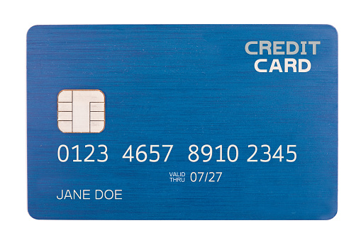 An isolated credit card with a chip.