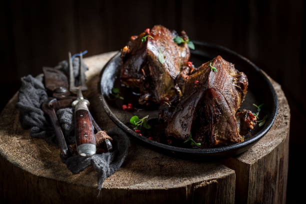 istock Two grilled pigeons with spices and pepper 656638164