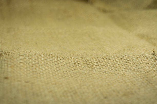 Closeup of Hemp fabric texture background selective focus