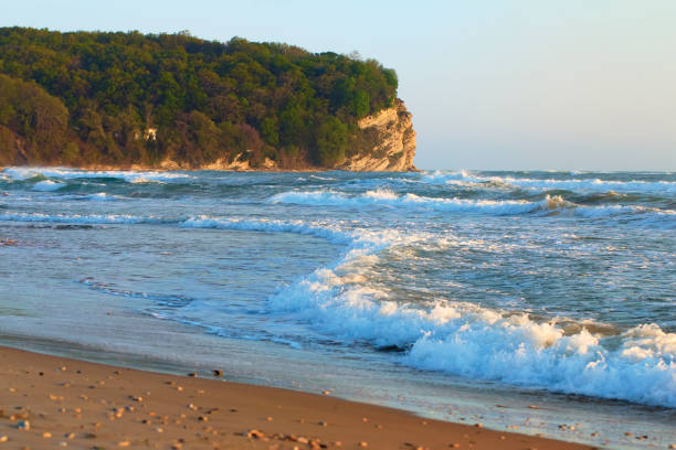 Coast of the Black Sea at sunset, Tuapse district, waves and rocks