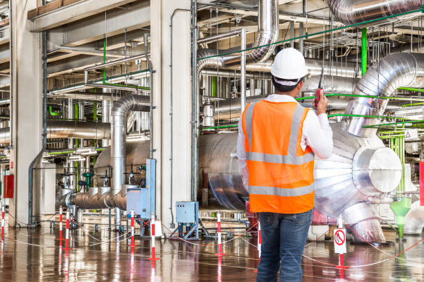 istock Engineer working in a thermal power plant with radio 656645868