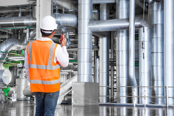 istock Engineer working in thermal power plant with talking on radio 656649428