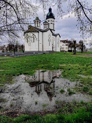 Reflection of church in water