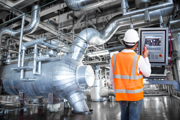 istock Maintenance engineer looking at monitor control in powerhouse 656650402