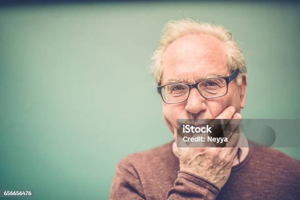 Worried Senior Man Portrait Stock Photo - Download Image Now - Toothache, 70-79 Years, Adult