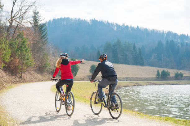 istock Couple Cycling Through Countryside Together 656656694