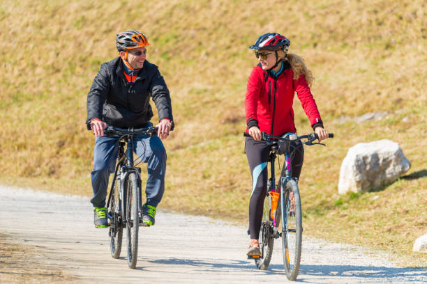 istock Couple Cycling Through Countryside Together 656656772