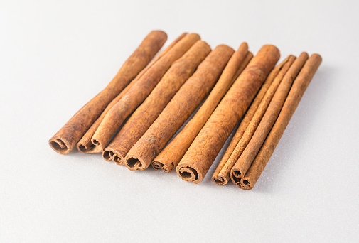 cinnamon stick on white backgroundcinnamon stick on white background