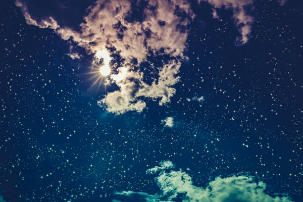 istock Amazing dark night sky with many stars, moon and cloudy. 656674240