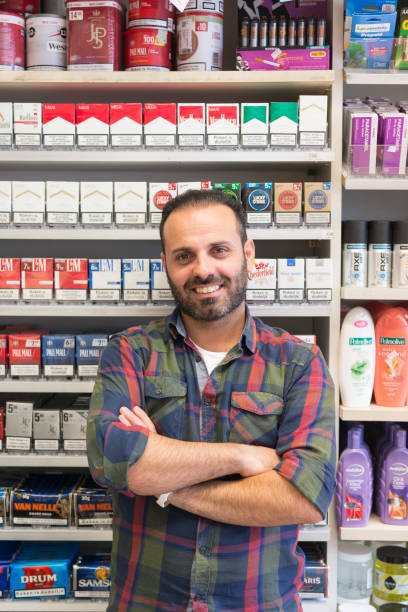 istock Immigrant kiosk owner in Europe 656677328