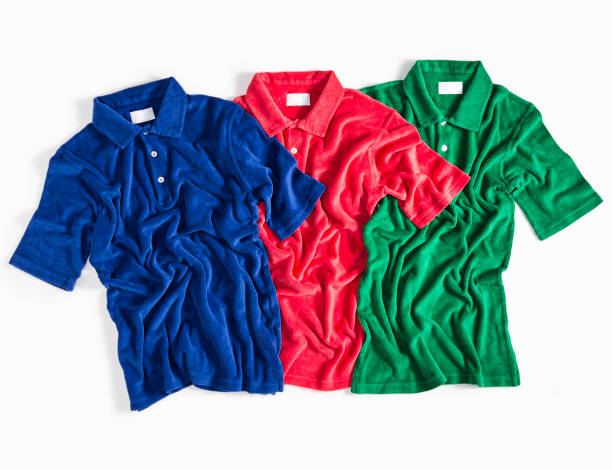 polo shirts - polo shirt multi colored clothing variation stock-fotos und bilder