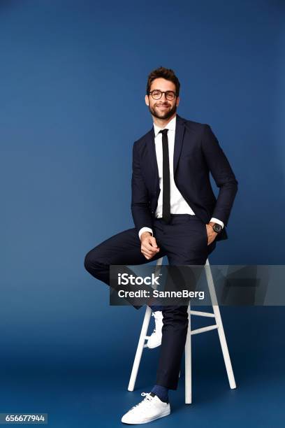 Business Dude On Stool Stock Photo - Download Image Now - Men, Portrait, Sitting