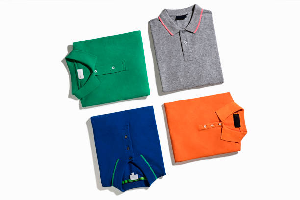 polo shirts - polo shirt multi colored clothing variation stock-fotos und bilder