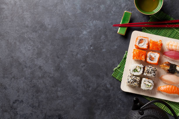 istock Set of sushi, maki and green tea 656685498