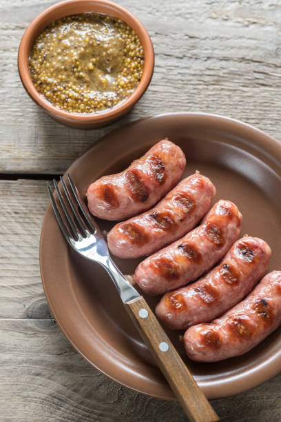 istock Grilled sausages with mustard sauce 656688750