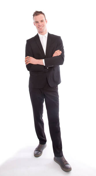 istock Young businessman standing isolated on white background 656689608