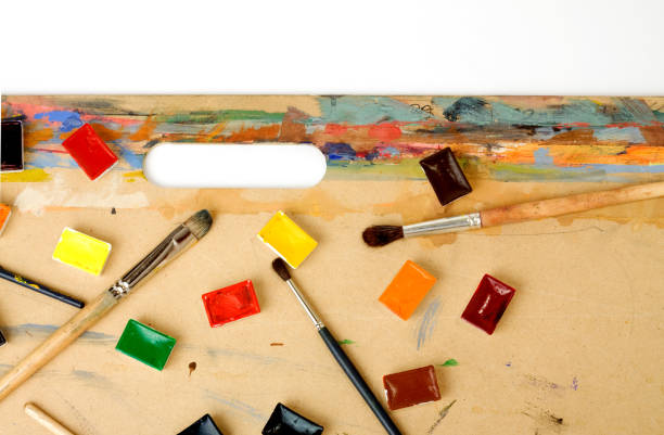 istock Palette and paintbrushes on tablet colorful 656692770