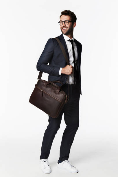 riendo el hombre de negocios - men briefcase business bag fotografías e imágenes de stock