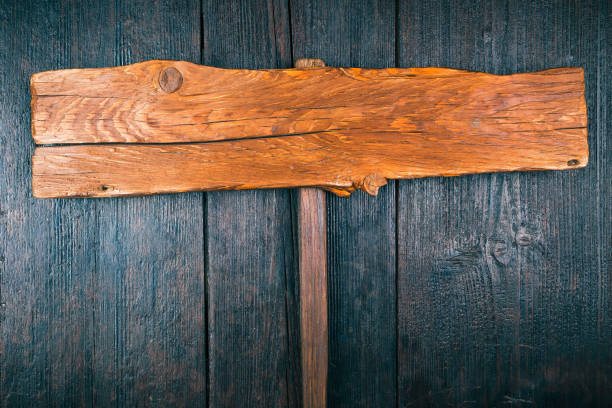 istock Old wood signboard close-up 656693320