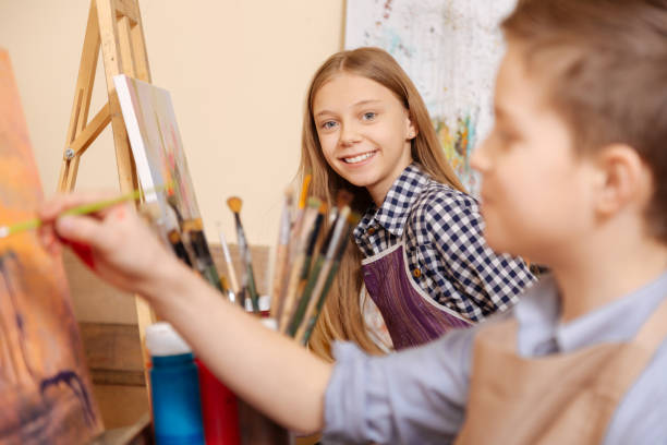 istock Delighted cute children painting in the art studio 656693386