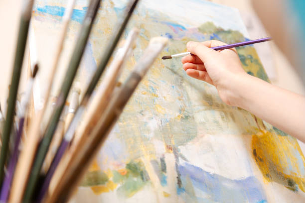 istock Successful kid painting in the art studio 656698640