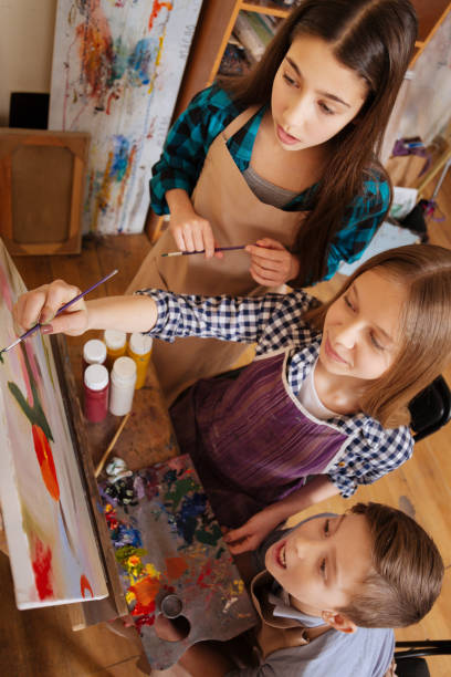 istock Talented children mastering art skills at school 656699416
